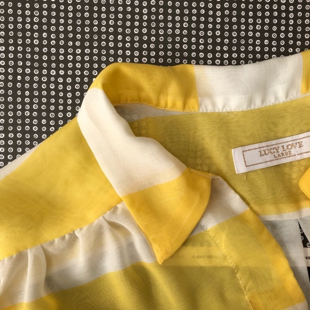 Bright yellow strip sheer top